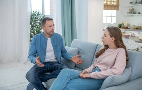 Talking to Her Father